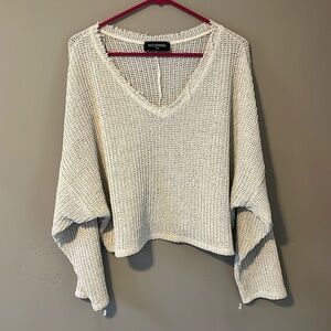 Kittenish beige sweater large